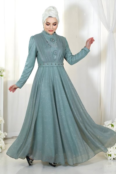 فستان سهرة لون منت بلمعة وصدر درابيه بتفاصيل أحجار