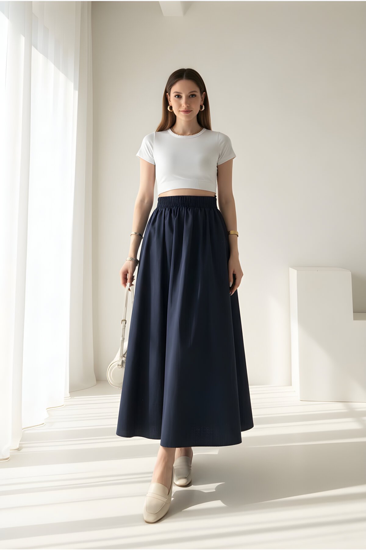 تنورة بوبلين كحلية بخصر مطاطي وجيبين - Safgiyim44