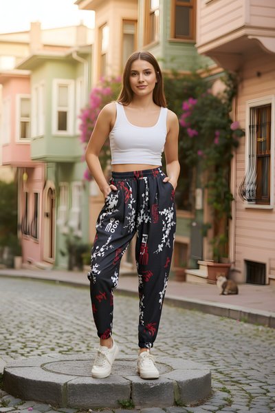 بنطال شروال رياضي نمط شارع أسود مطبوع قماش مجعد