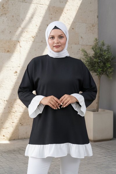 تونيك واسع أسود وسكري بكشكشة وتفاصيل متباينة